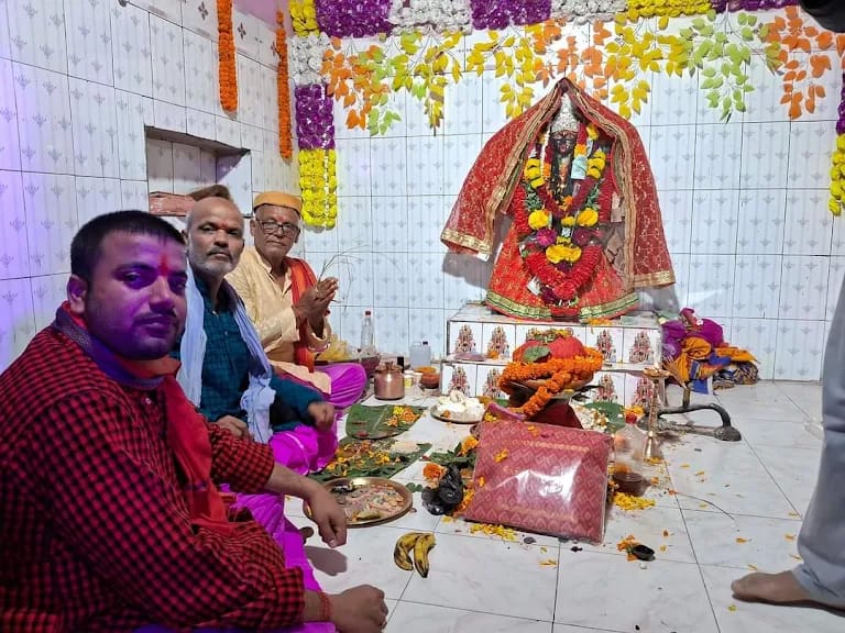 Kali Puja ceremony performed by Pandit Sourabh Thakur in a temple setting in Kolkata.